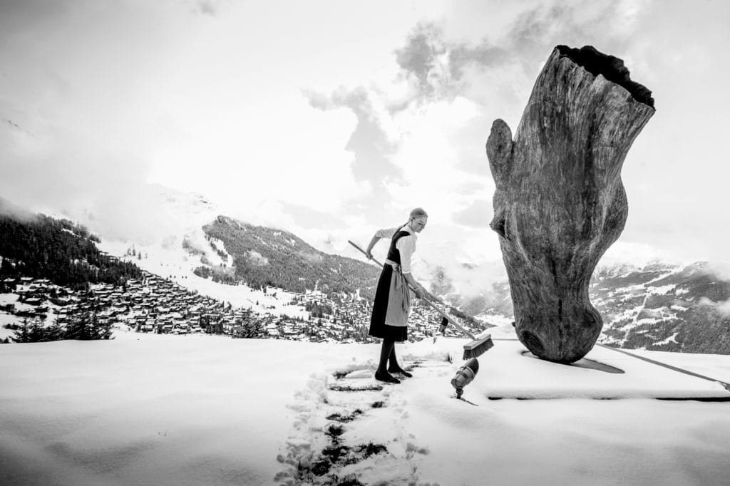 Host clearing snow