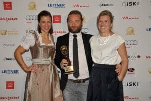 Duncan and Natasha collecting the award for Best Chalet in Austria in Kitzbühel.