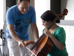 Gary Hoffman giving some guidance on the cello