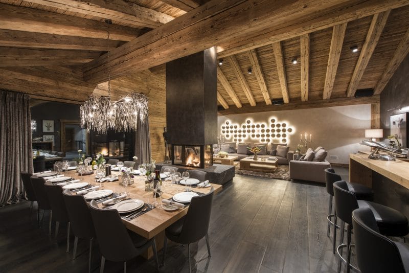 Switzerland's Best Ski Chalet: Chalet Aconcagua's The open-plan contemporary living and dining room